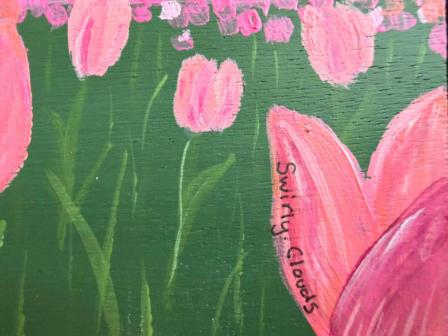 Tulips on wood